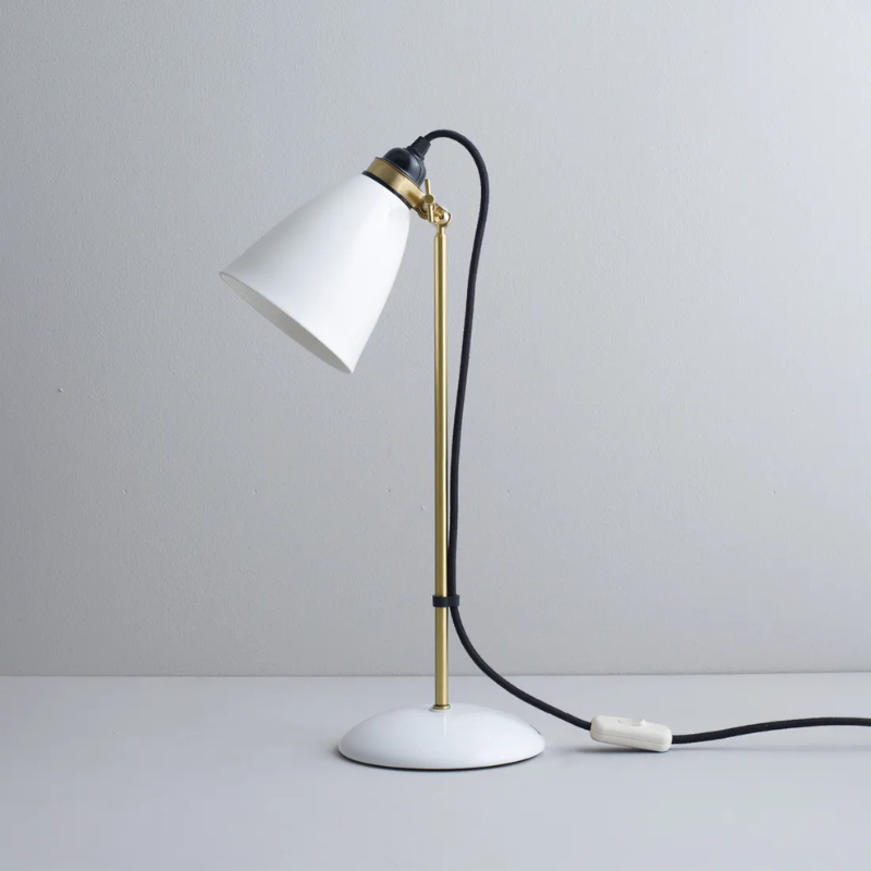 The Hector 30 Table Light from Original BTC with a black cable in a studio.