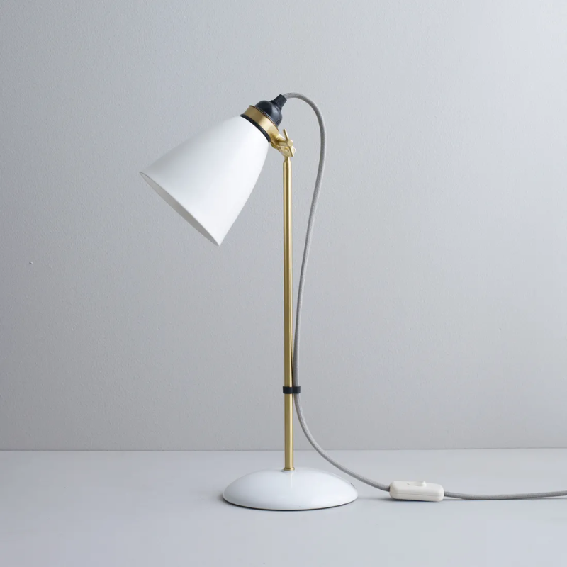The Hector 30 Table Light from Original BTC with a grey cable in a studio.