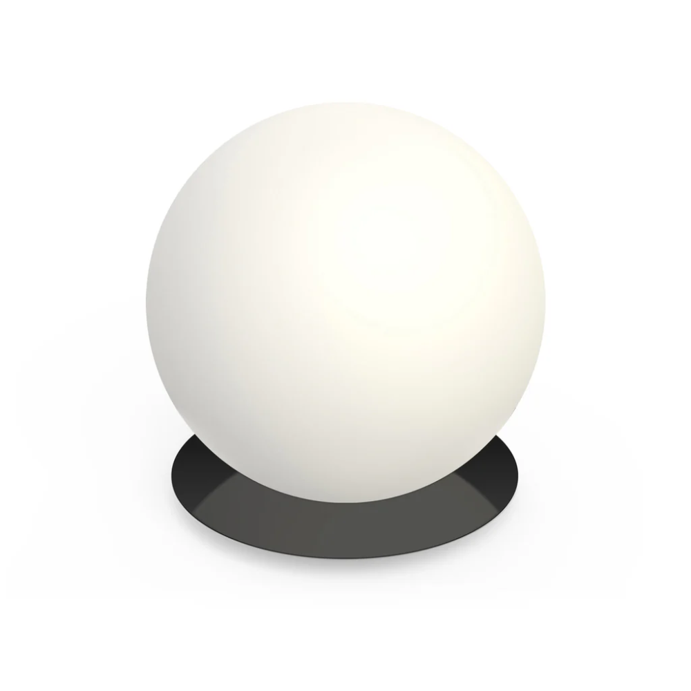 The 16 inch matte black Bola Sphere Table from Pablo Designs.
