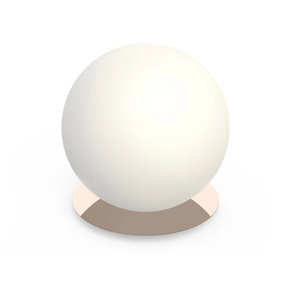 The 16 inch rose gold Bola Sphere Table from Pablo Designs.