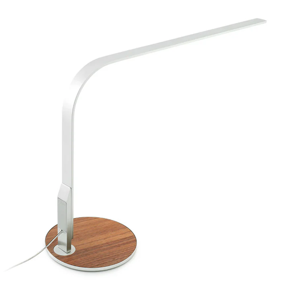 The aluminum and walnut LIM360 Table Lamp from Pablo Designs.