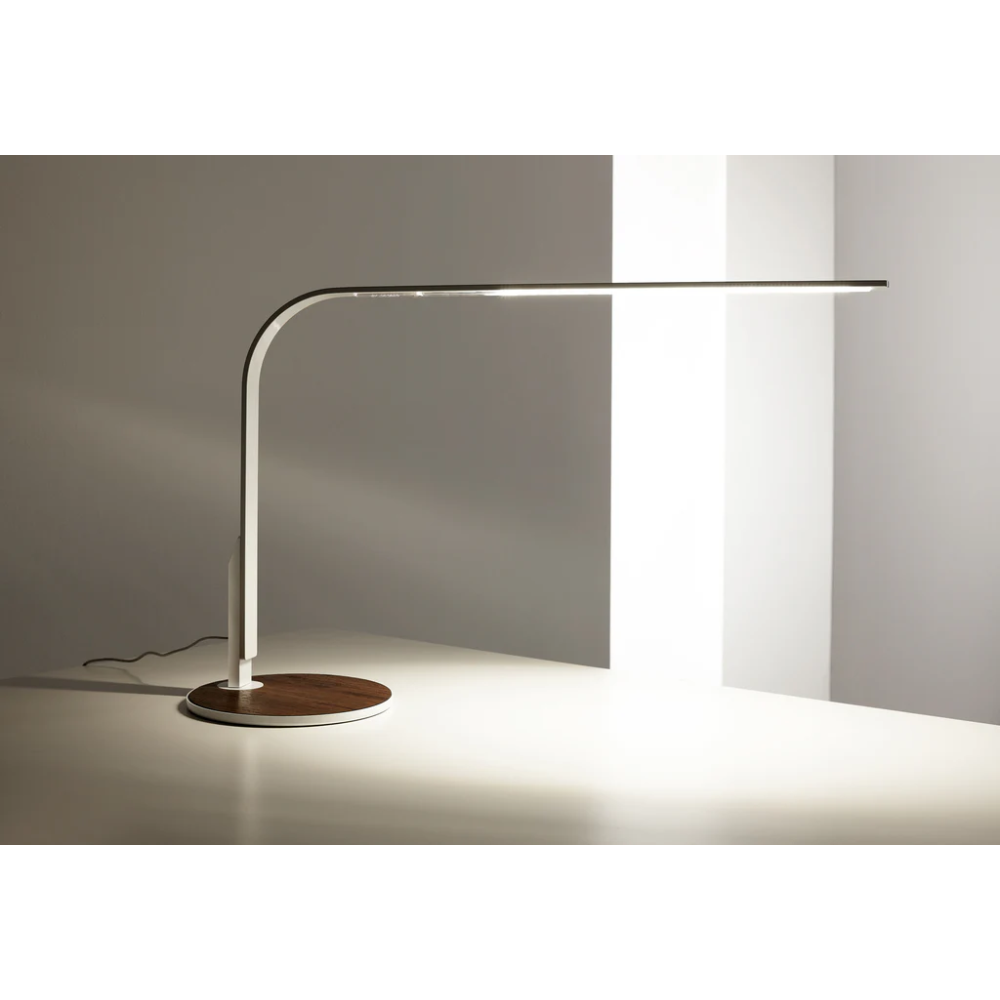 The LIM360 Table Lamp from Pablo Designs in a family area. all-groups