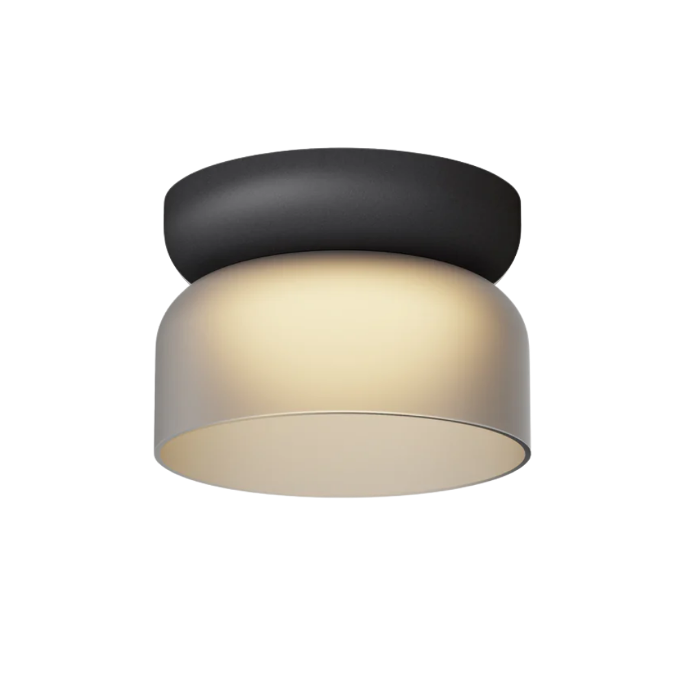 The Totem Mini Flush Mount by Pablo Designs with an etched smoke shade and black base mount.