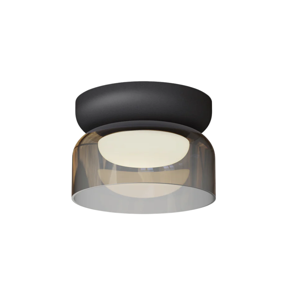 The Totem Mini Flush Mount by Pablo Designs with a smoke shade and black base mount.