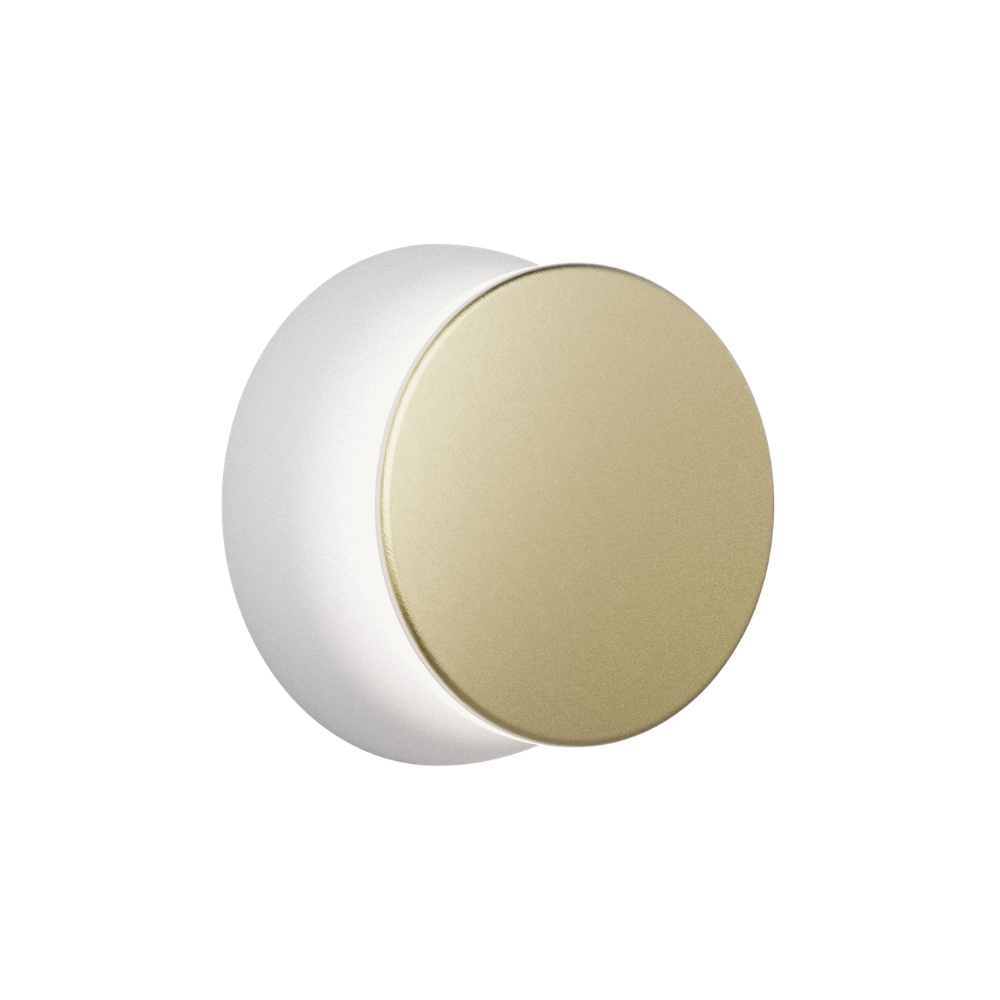 The grey and brass Totem Puck Ceiling or Wall Light from Pablo Designs.