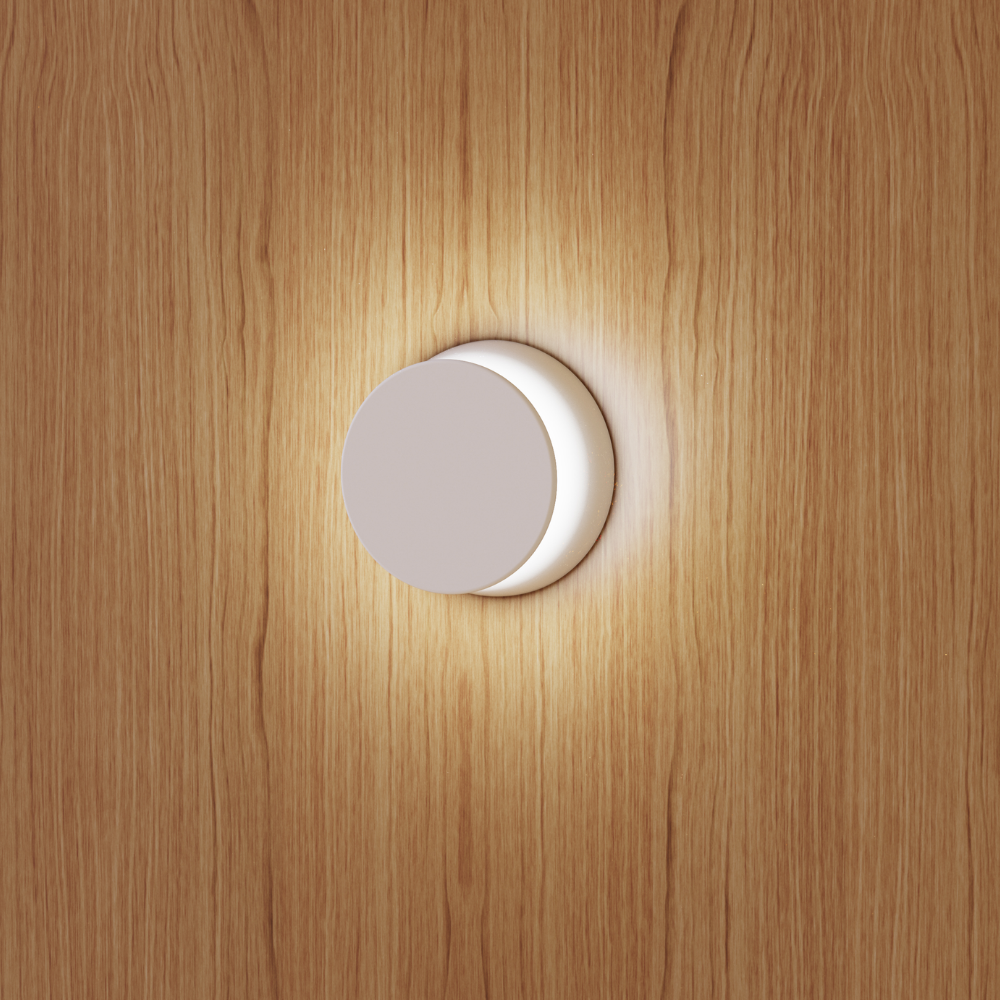 The Totem Puck Ceiling or Wall Light from Pablo Designs in a living room. all-groups