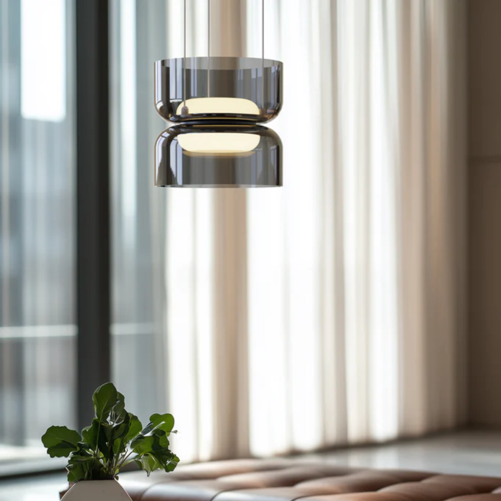 The The Totem Up/Down Mini Pendant from Pablo Designs in a lounge. all-groups