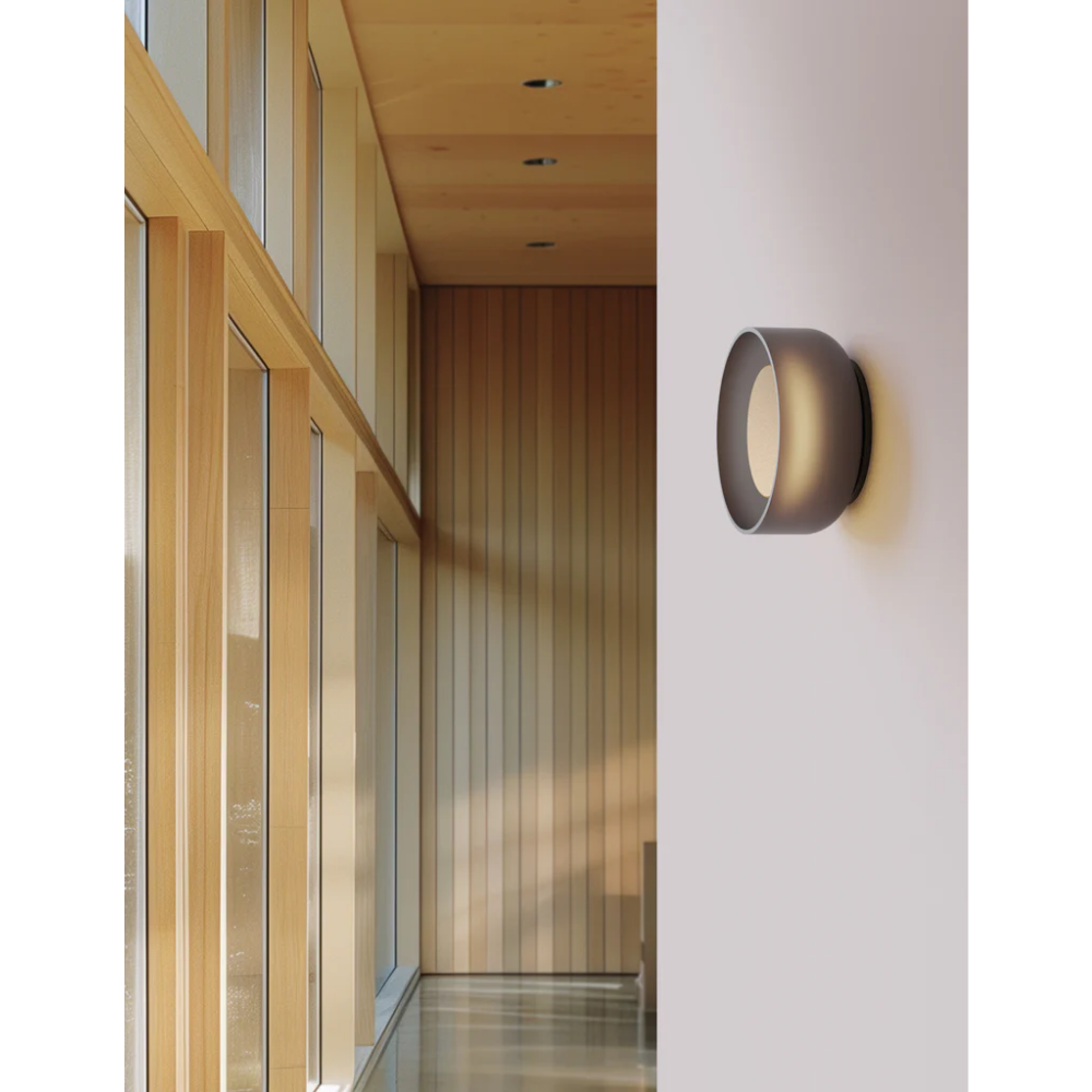 The Totem Sconce by Pablo Designs in Etched Smoke in a family area. all-groups