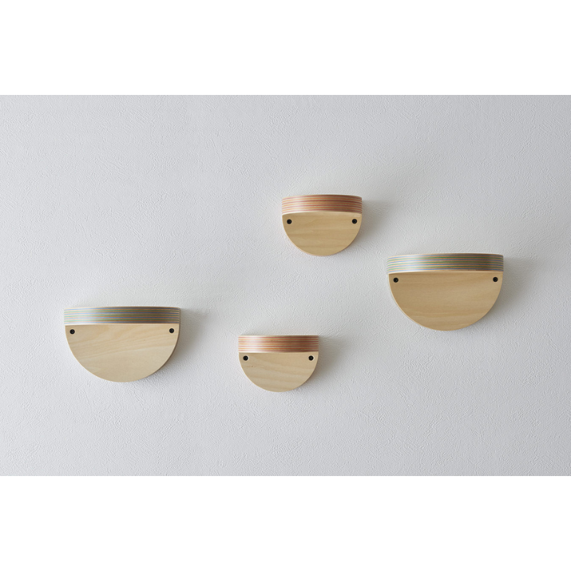 The small and large Cap Wall Shelf from Plywood Laboratory in all colors within a home office. all-groups