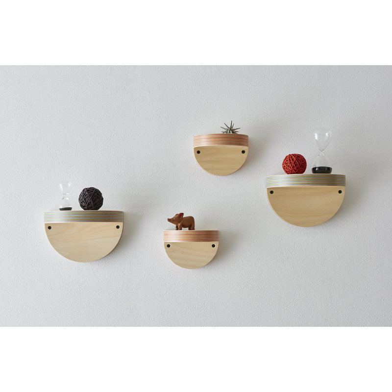 The small and large Cap Wall Shelf from Plywood Laboratory in a living room in all available colors. all-groups