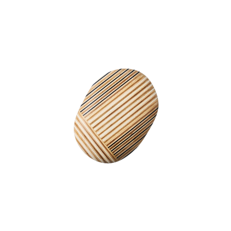 The Koishi Paperweight from Plywood Laboratory ellipse shape in navy.
