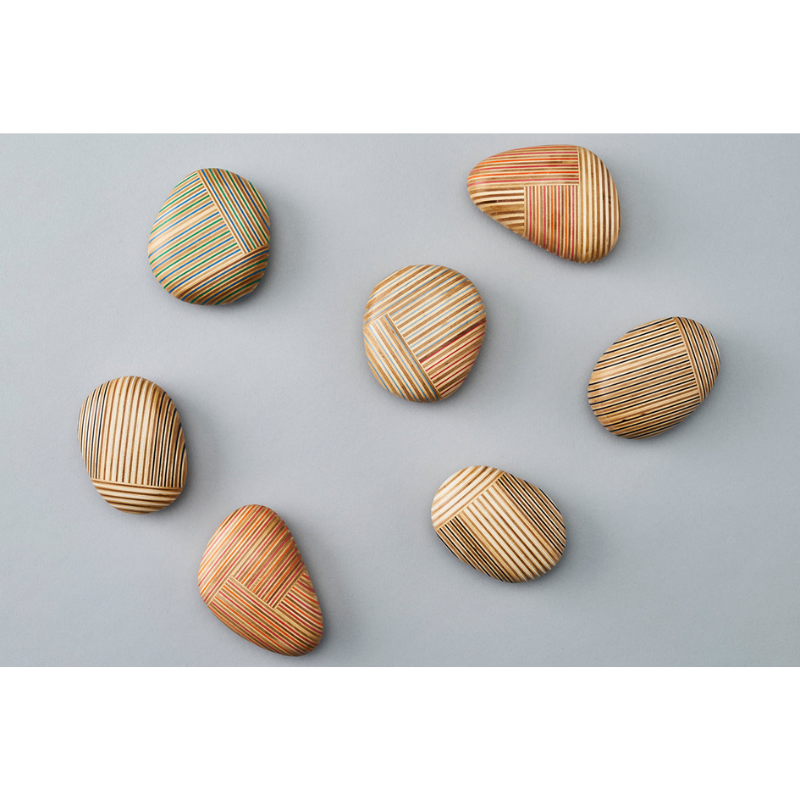 The various Koishi Paperweights from Plywood Laboratory in a home office. all-groups