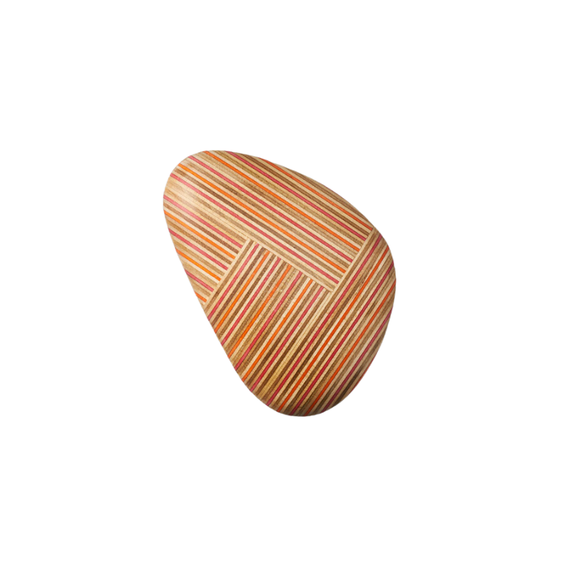 The Koishi Paperweight from Plywood Laboratory triangle shape in red orange.