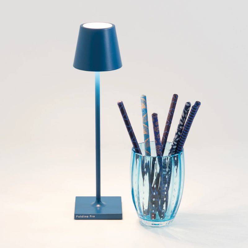 The capri blue Poldina Pro Micro from Zafferano in a home office.