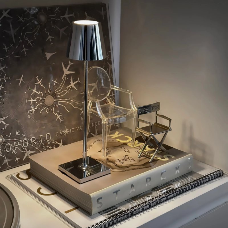 The glossy chrome Poldina Pro Micro from Zafferano in a living area.