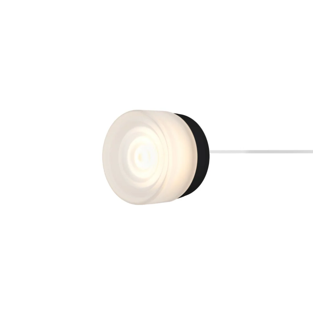 The Ripple Corded Sconce with plug-in back in frosted shade with black anodized.