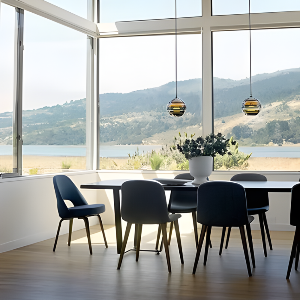 The Banded Stone Mini Pendant from Siemon and Salazar in a dining room.