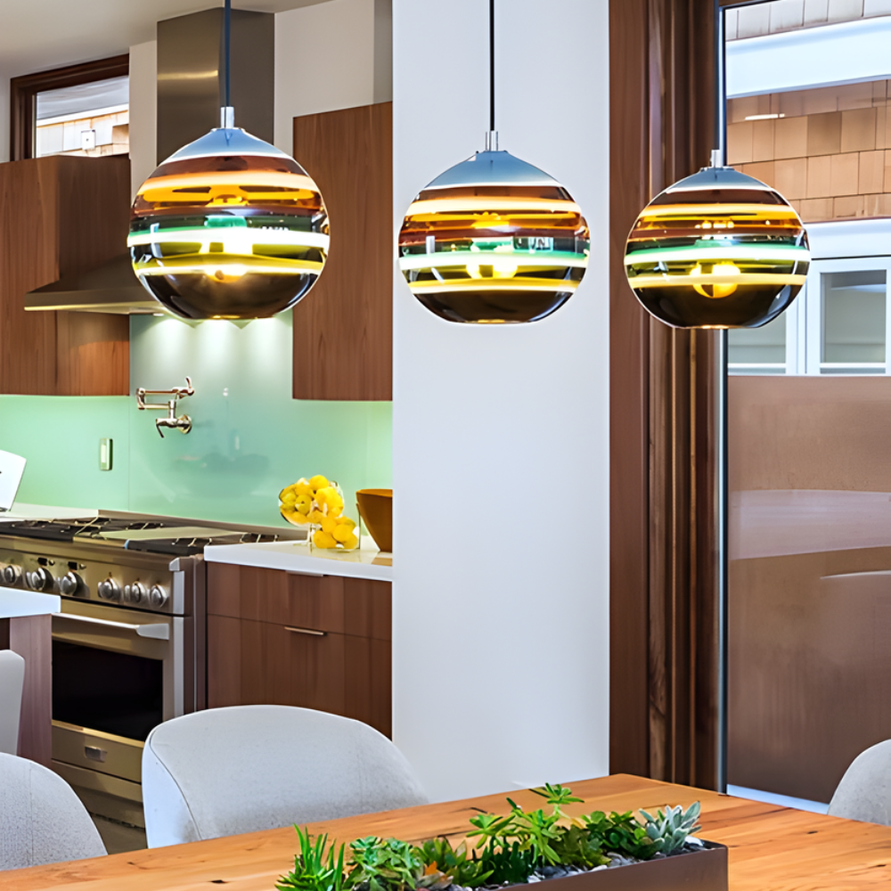The Banded Stone Mini Pendant from Siemon and Salazar in a kitchen and dining space.