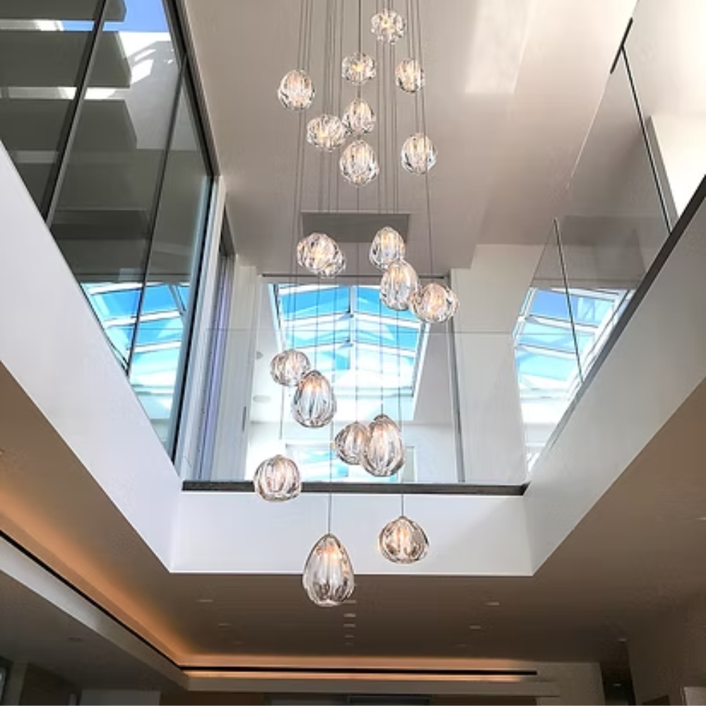 The Barnacle Small Cone Clear Pendant from Siemon and Salazar in a business space.