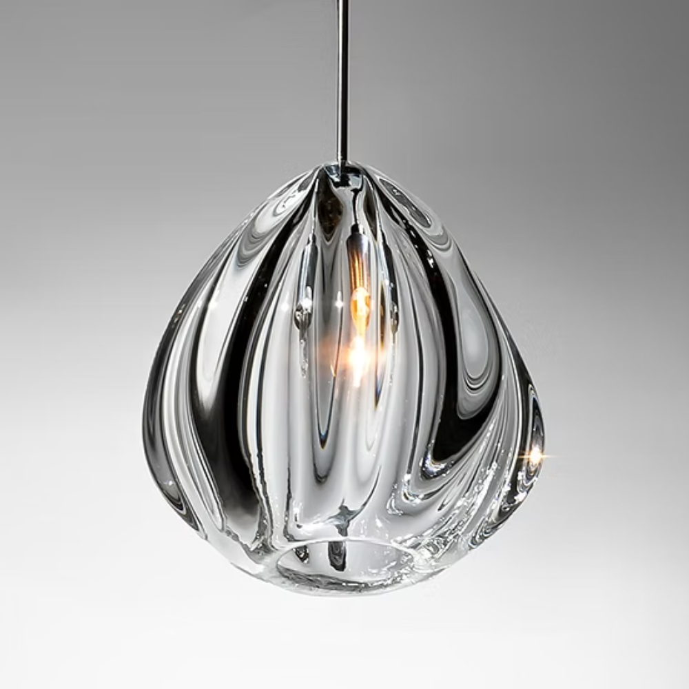 The Barnacle Small Cone Clear Pendant from Siemon and Salazar in a studio.