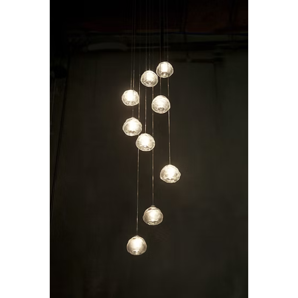 The clear Happy Small Pendant from Siemon and Salazar in a living space.