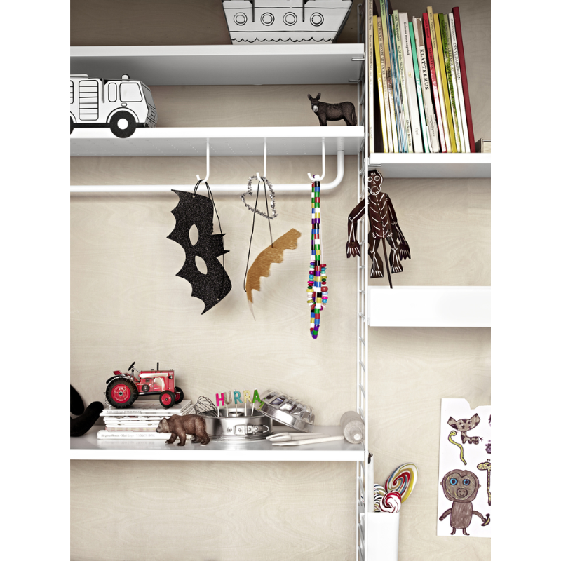 The Low Metal Shelf from String Furniture in a kids room.