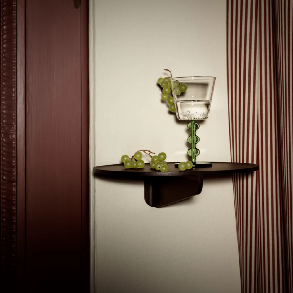 The Museum NM&.045 Console Shelf from String Furniture in Brown on a wall.