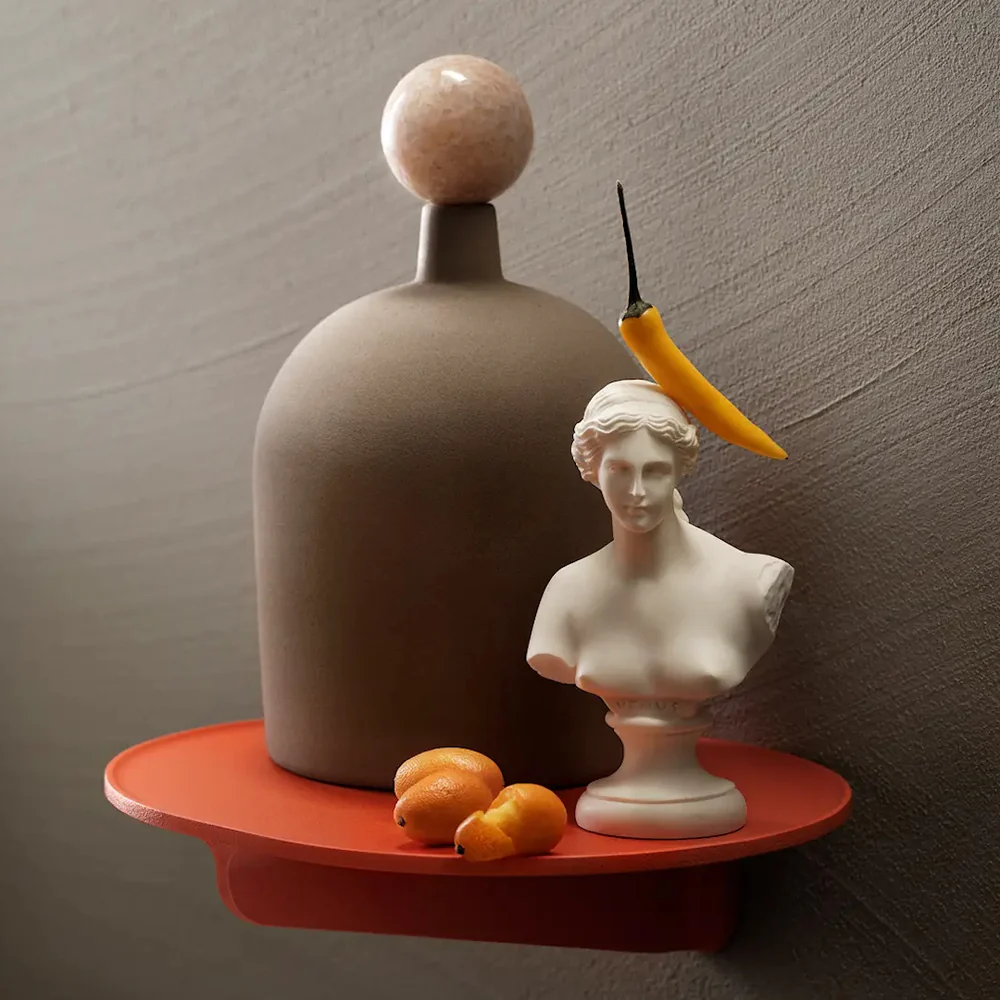 The Museum NM&.045 Console Shelf from String Furniture in Orange on a wall.