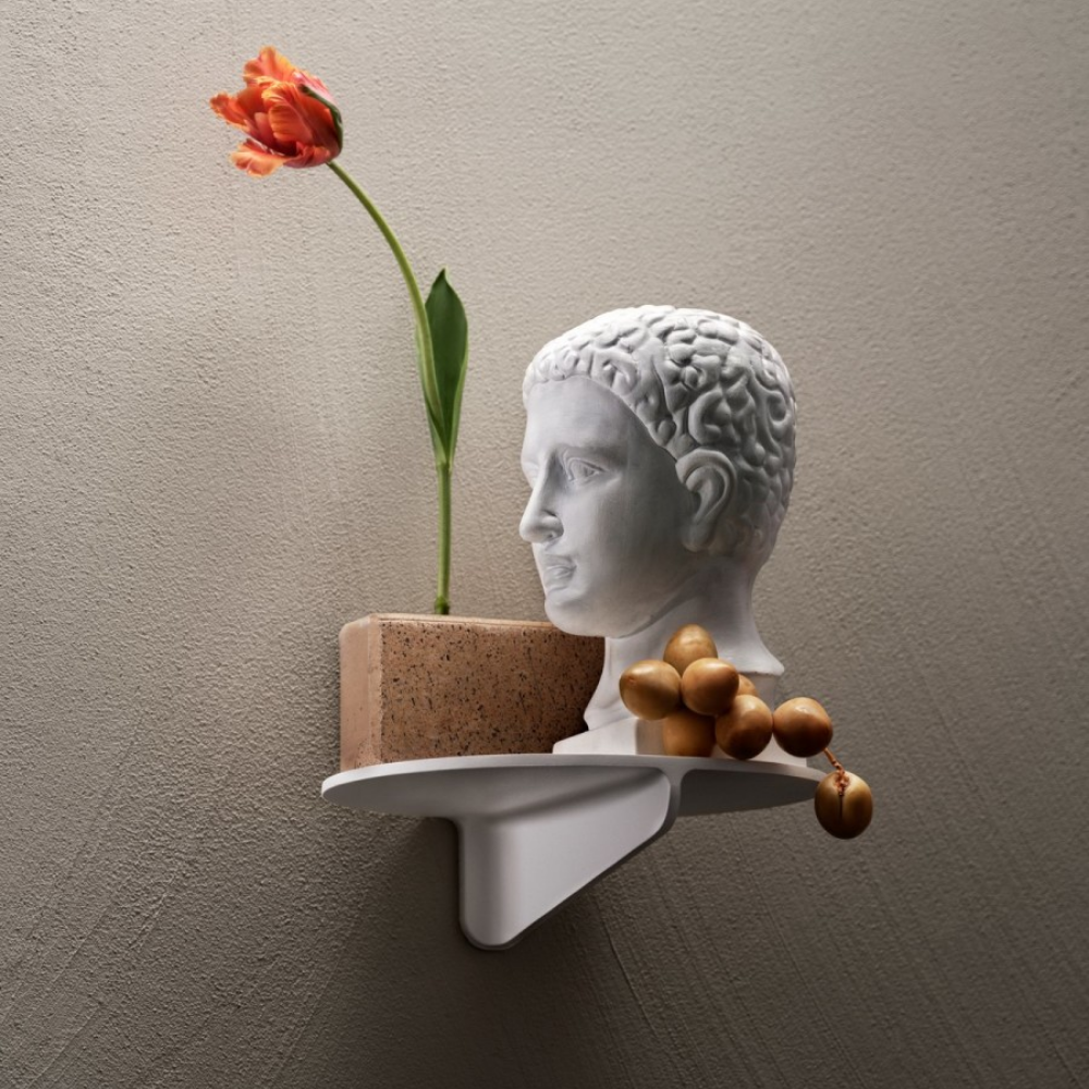 The Museum NM&.045 Console Shelf from String Furniture in white mounted on a wall.