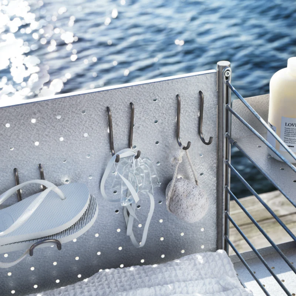 The String Outdoor Bundle from String Furniture being used outside.