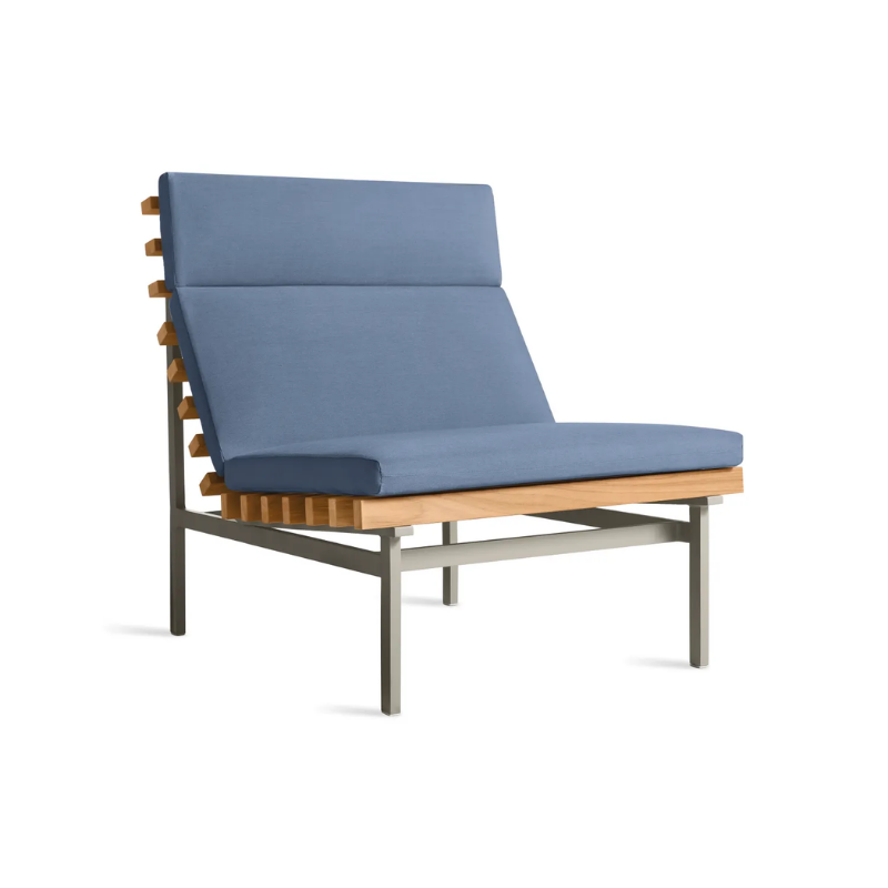 The Perch Outdoor Lounge Chair from Blu Dot with carbon frame and sunbrella haze upholstery from an angle.