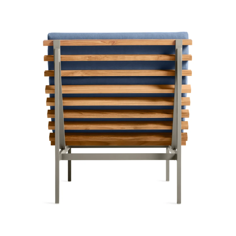 The Perch Outdoor Lounge Chair from Blu Dot with carbon frame and sunbrella haze upholstery from the back.