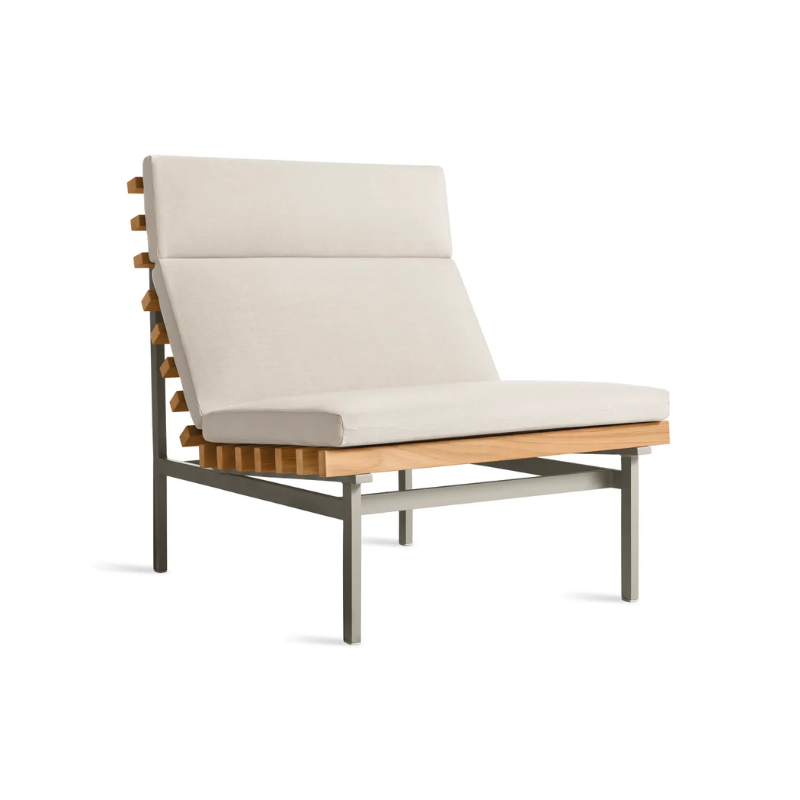 The Perch Outdoor Lounge Chair from Blu Dot with carbon frame and sunbrella linen upholstery from an angle.