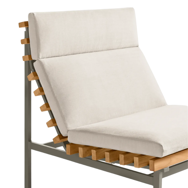 The Perch Outdoor Lounge Chair from Blu Dot with carbon frame and sunbrella linen upholstery close up.
