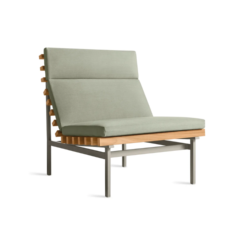 The Perch Outdoor Lounge Chair from Blu Dot with carbon frame and sunbrella oasis upholstery from an angle.