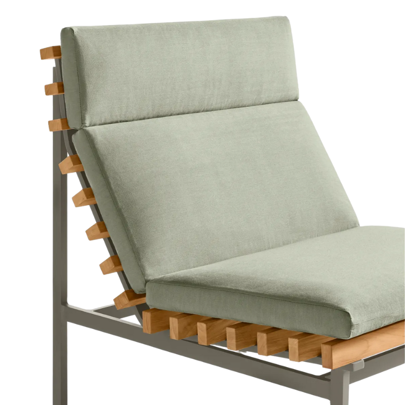 The Perch Outdoor Lounge Chair from Blu Dot with carbon frame and sunbrella oasis upholstery close up.