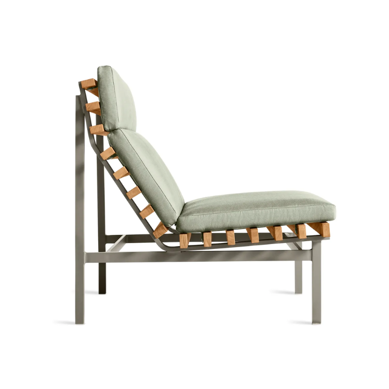 The Perch Outdoor Lounge Chair from Blu Dot with carbon frame and sunbrella oasis upholstery from the side.