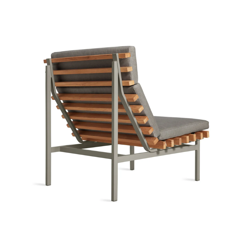 The Perch Outdoor Lounge Chair from Blu Dot with carbon frame and toohey charcoal upholstery from the back at an angle.