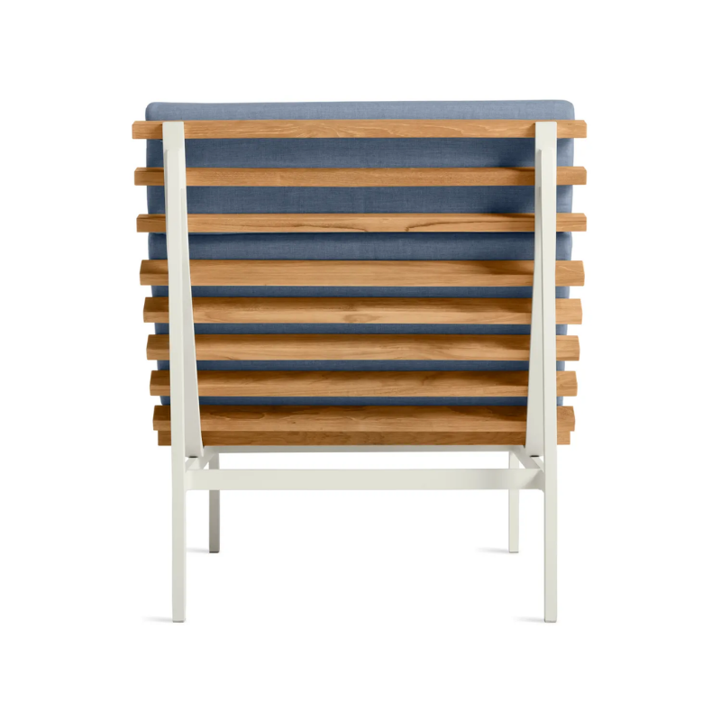 The Perch Outdoor Lounge Chair from Blu Dot with white frame and sunbrella haze upholstery from the back.