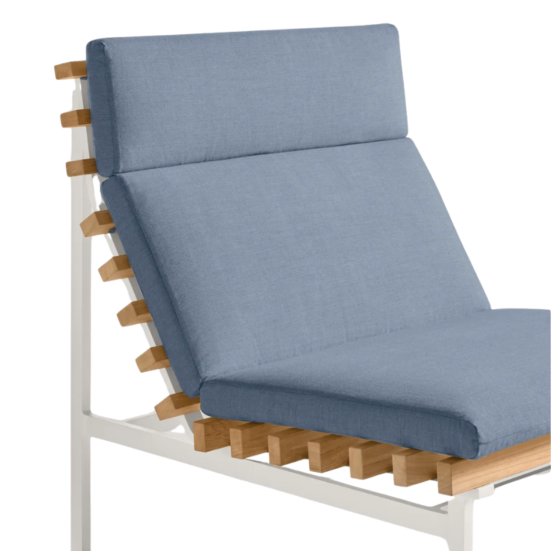 The Perch Outdoor Lounge Chair from Blu Dot with white frame and sunbrella haze upholstery close up.