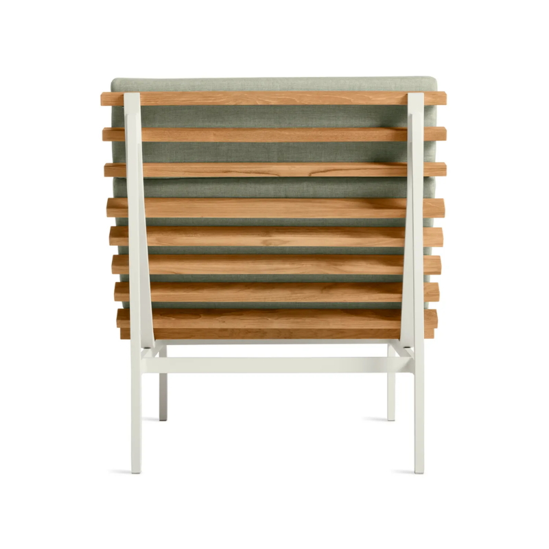 The Perch Outdoor Lounge Chair from Blu Dot with white frame and sunbrella oasis upholstery from the back.