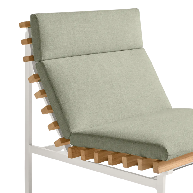The Perch Outdoor Lounge Chair from Blu Dot with white frame and sunbrella oasis upholstery close up.