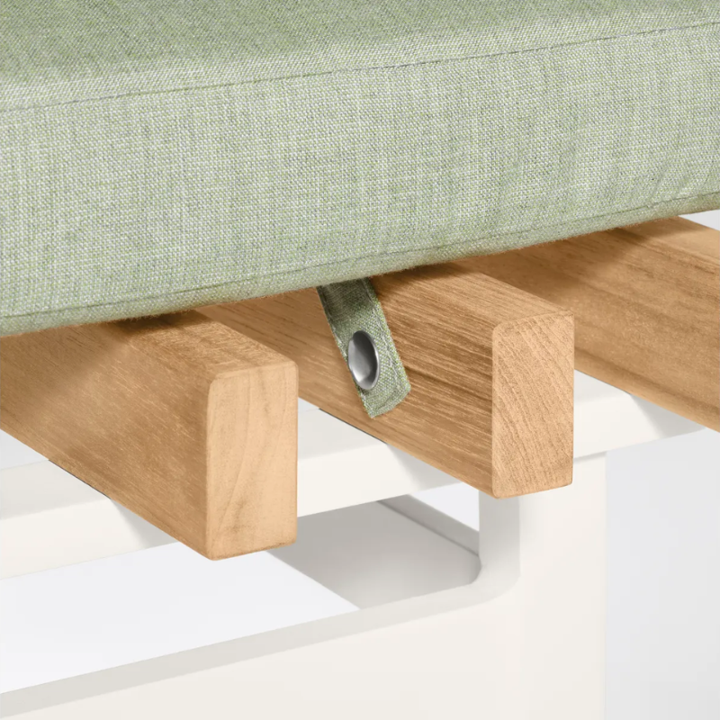 The Perch Outdoor Ottoman from String Furniture with white frame and sunbrella oasis upholstery in detail.