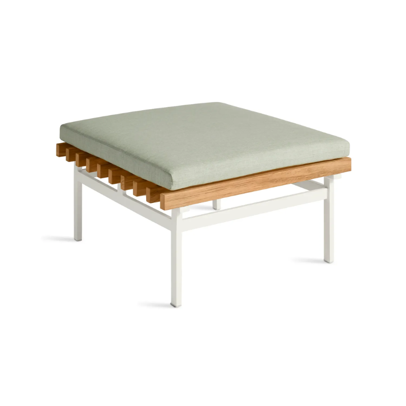 The Perch Outdoor Ottoman from String Furniture with white frame and sunbrella oasis upholstery from a high angle.