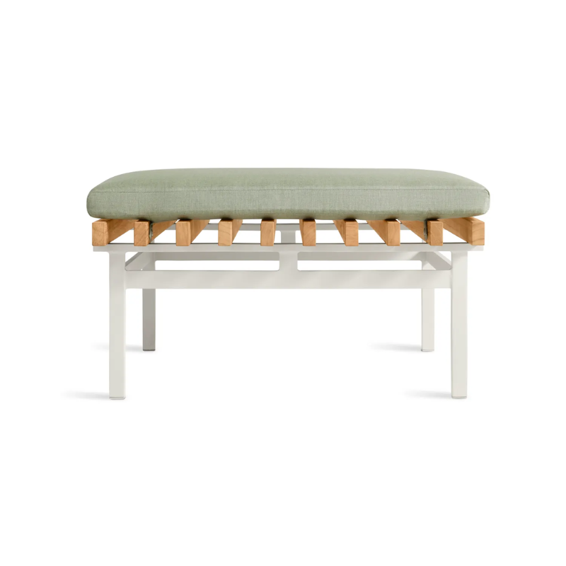 The Perch Outdoor Ottoman from String Furniture with white frame and sunbrella oasis upholstery from the side.