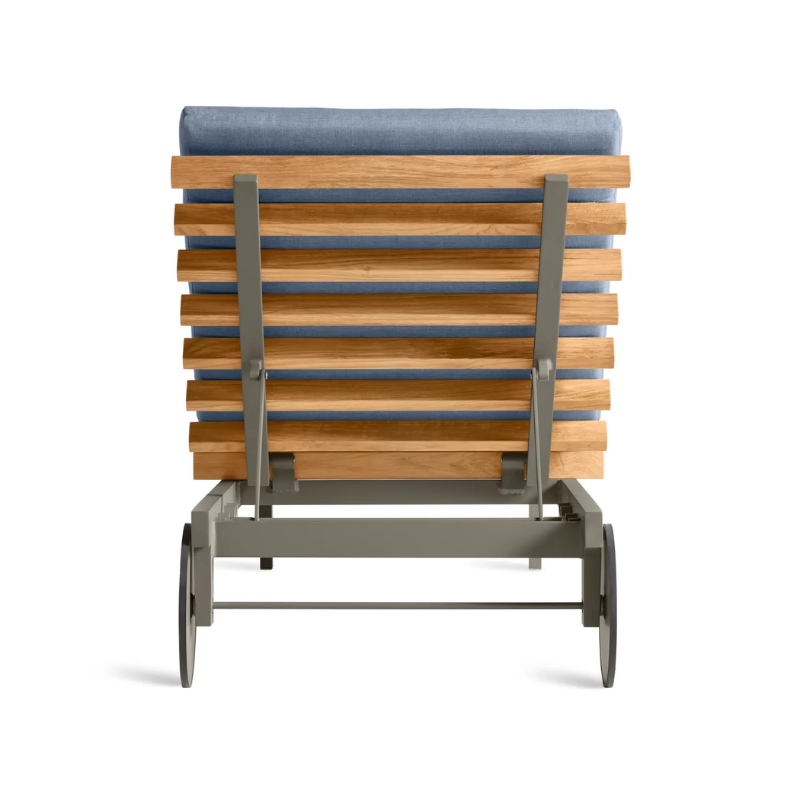 The Perch Outdoor Sun Lounger from Blu Dot with the carbon frame and sunbrella haze upholstery from the back.