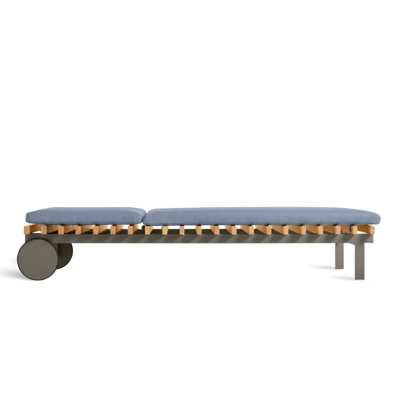 The Perch Outdoor Sun Lounger from Blu Dot with the carbon frame and sunbrella haze upholstery flat.