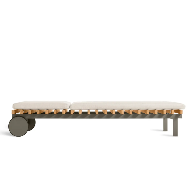 The Perch Outdoor Sun Lounger from Blu Dot with the carbon frame and sunbrella linen upholstery flat.