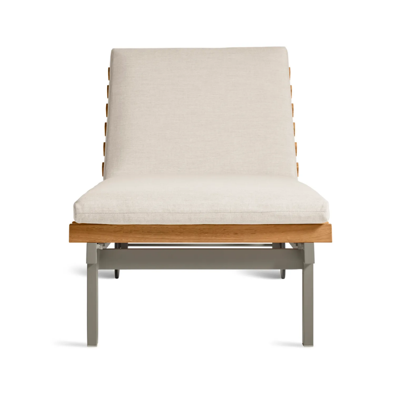 The Perch Outdoor Sun Lounger from Blu Dot with the carbon frame and sunbrella linen upholstery from the front.