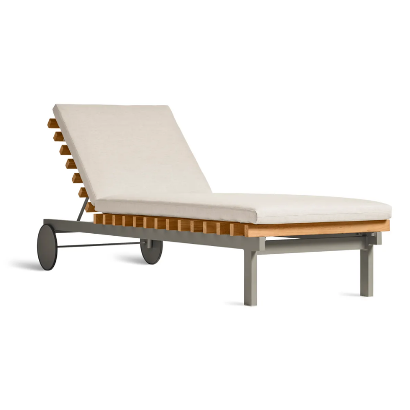 The Perch Outdoor Sun Lounger from Blu Dot with the carbon frame and sunbrella linen upholstery.